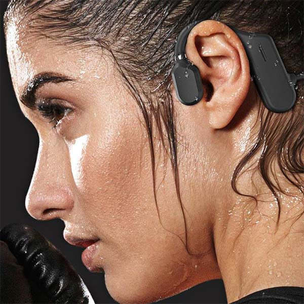 Arenzza Bone Conduction Bluetooth Headphones resting on a surface, showcasing their sleek design and open-ear style for 3C audio devices.