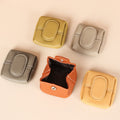 Arenzza solid color mini coin purse in various bright colors, featuring a compact, portable bag design with a zipper closure.