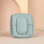 Arenzza cute portable mini coin purse in various solid colors, showcasing a compact bag design with a zipper closure.