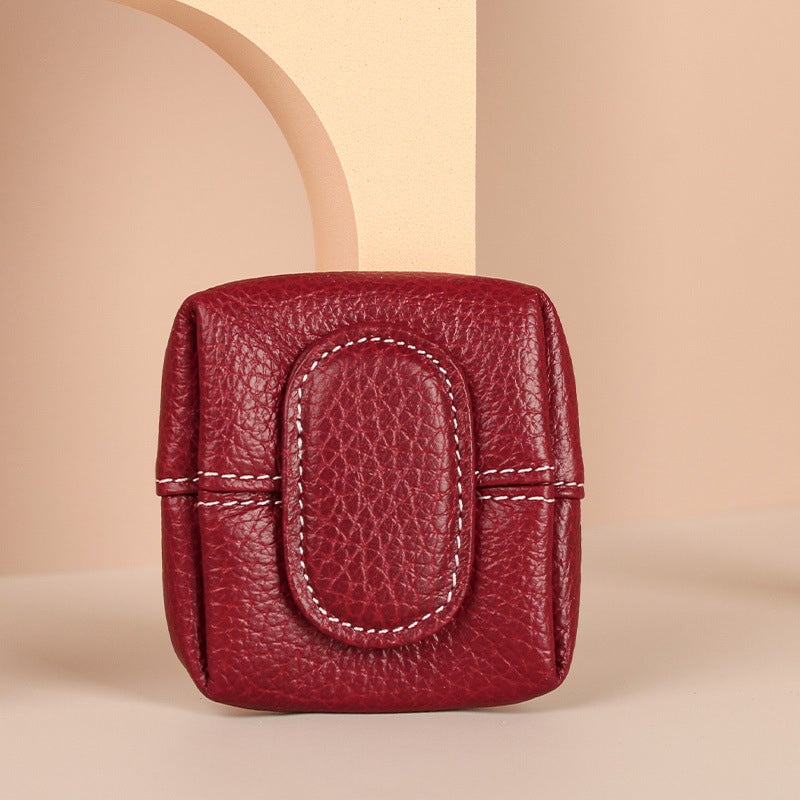 Aarenza mini coin purse in vibrant solid colors, featuring a compact bag design with a zipper closure and a cute, portable style.