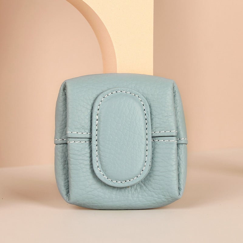 Arenzza cute portable mini coin purse in solid color with a zipper closure, displayed in various vibrant colors.