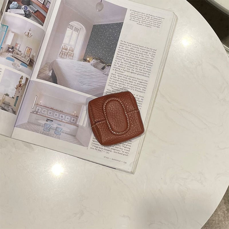 Arenzza cute portable mini coin purse in solid colors, small bag with a zipper closure, perfect for carrying coins and essentials.