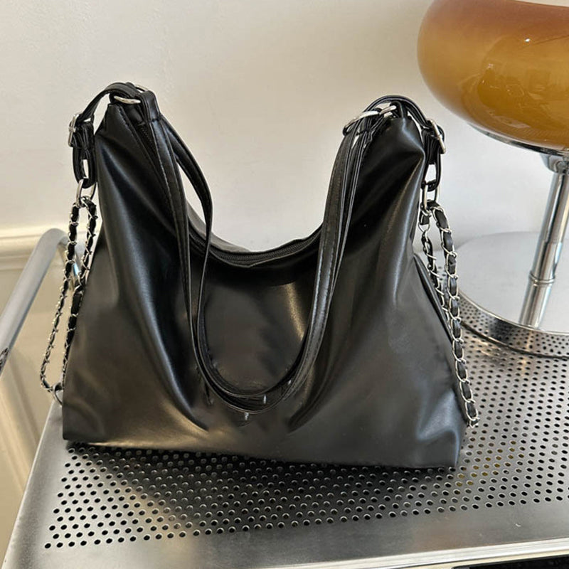 Large textured soft leather bag for women by Arenzza, stylish and spacious with a sleek design suitable for everyday use.
