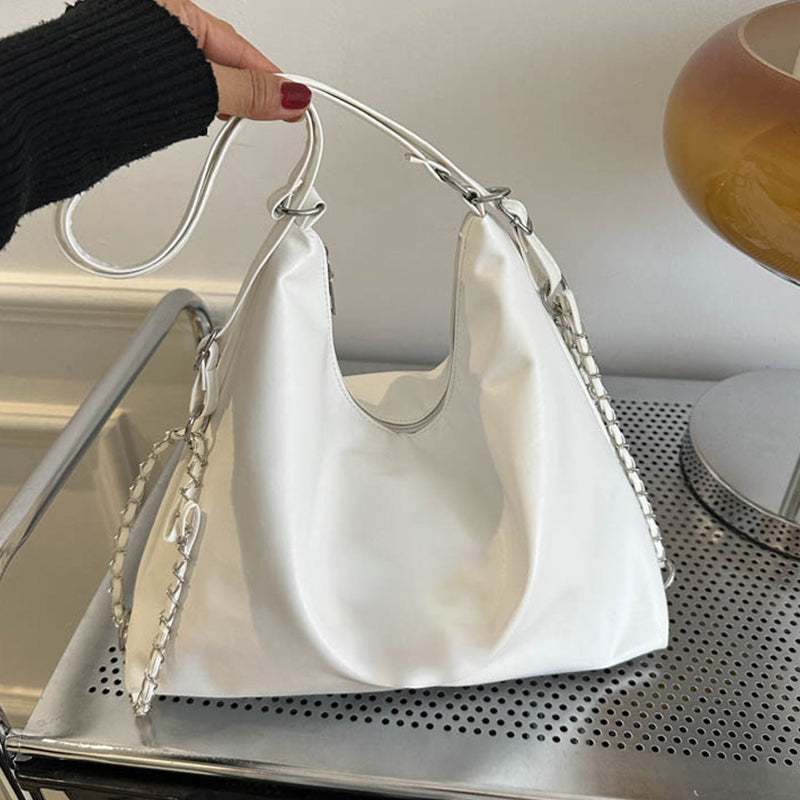 Large textured soft leather bag for women by Arenzza, showcasing spacious design and elegant craftsmanship.