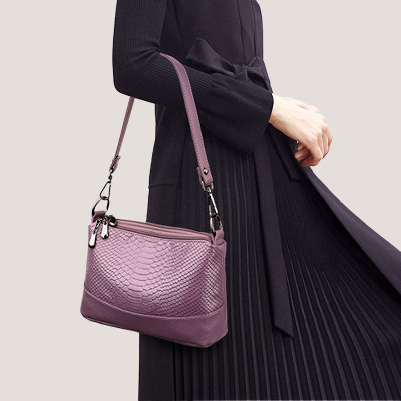 Arenzza fashionable shoulder bag with crocodile print, featuring a sleek design and textured leather surface.