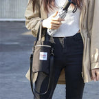 Arenzza outdoor multifunctional bag with multiple compartments, designed for travel and outdoor use, shown in black.