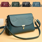 Multi-layer women's leather bag by Arenzza featuring a stylish design with multiple compartments and a sleek finish.