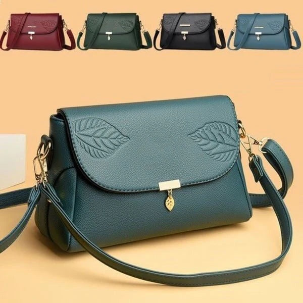 Multi-layer women's leather bag by Arenzza featuring a stylish design with multiple compartments and a sleek finish.