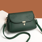 Aarenza multi-layer women's leather bag with multiple compartments, stylish design, and adjustable straps.