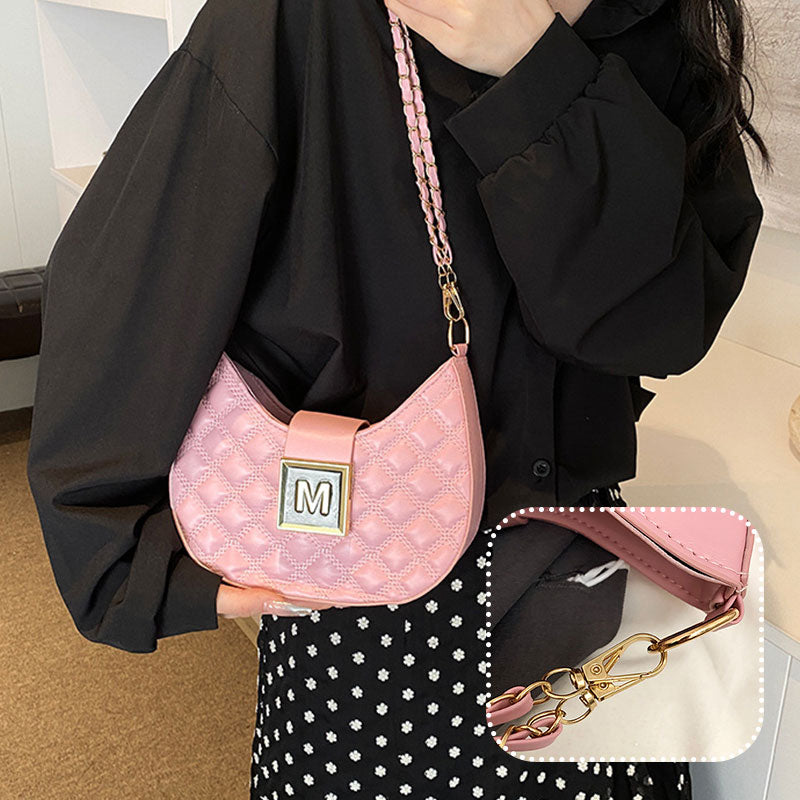 Women’s quilted dumpling design chain crossbody bag by Arenzza, showing its quilted pattern, chain strap, and compact style.