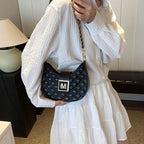 Aarenza women's quilted dumpling design chain crossbody bag with a sleek chain strap and quilted pattern.
