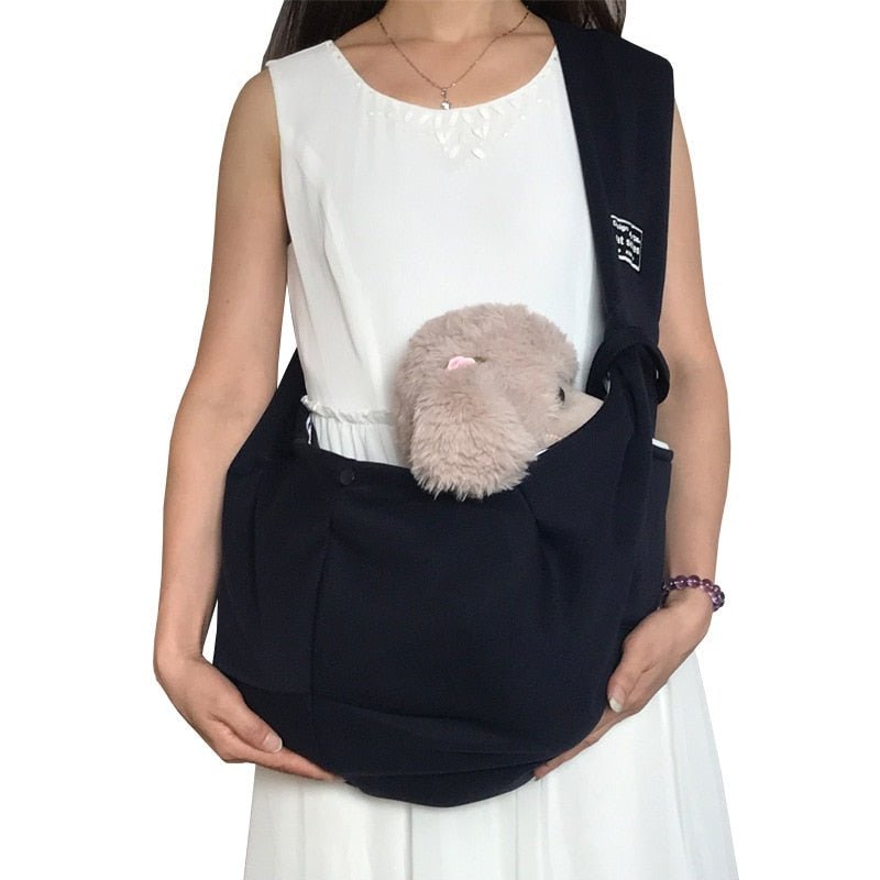 Arenzza dog sling carrier bag with adjustable strap and cozy interior, perfect for carrying small dogs comfortably.