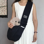 Arenzza dog sling carrier bag with adjustable strap, soft fabric interior, designed for comfortable pet carrying.