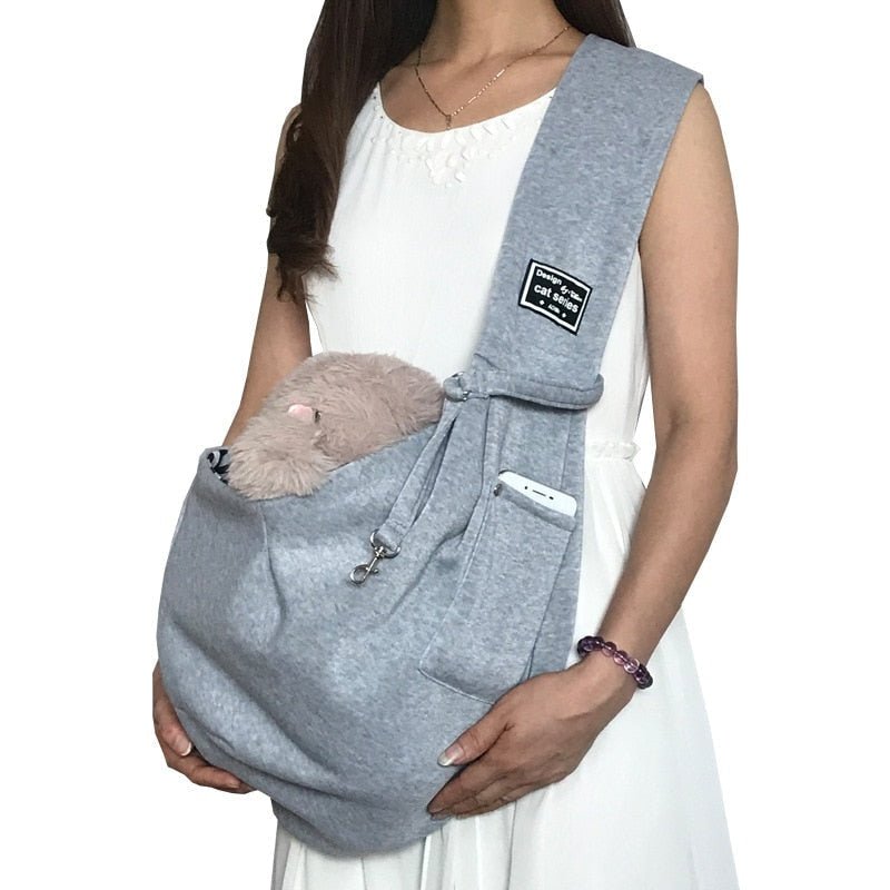 Arenzza dog sling carrier bag with adjustable strap and soft fabric for comfortable pet transportation.