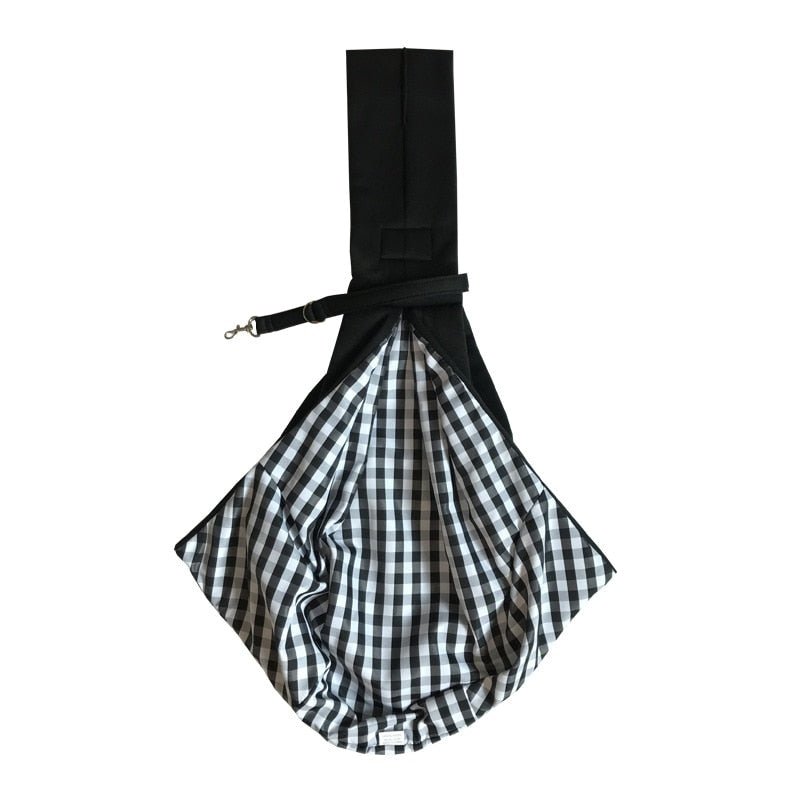 Arenzza dog sling carrier bag with adjustable strap and cozy interior for comfortable pet carrying.