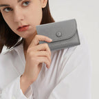 Aarenza lychee pattern PU leather short wallet with snap button closure, featuring a festive Christmas design and compact bag style.