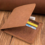 Engraved genuine leather wallet by Arenzza, featuring detailed craftsmanship and a sleek bag design, perfect for everyday use.