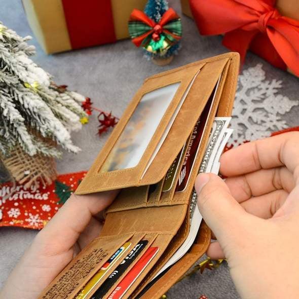Aarenza engraved genuine leather wallet showcasing detailed craftsmanship with a sleek, compact design.