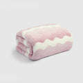 Arenzza premium soft, ultra-absorbent bathroom towel displayed in a bathroom setting, showcasing its plush texture and large size.