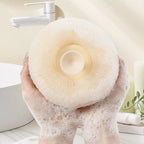 Super soft sunflower suction cup bath ball by Arenzza, shown in a bathroom setting with bright yellow sunflower design.