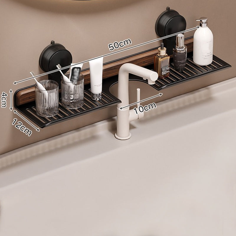 Walnut suction cup bathroom shelf by Arenzza, mounted on the wall, with a smooth wooden finish and space for toiletries.