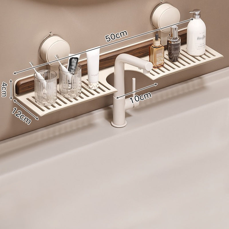 Arenzza Walnut Suction Cup Bathroom Shelf mounted on a bathroom wall with soap and toiletries arranged on it.