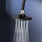 Arenzza 360° adjustable square showerhead installed in a modern bathroom, showcasing its sleek design and versatile water spray.