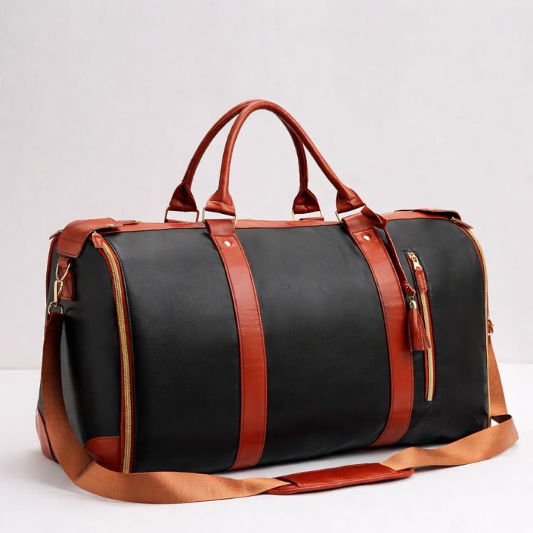 Aarenza EasyCarry™ ultra-capacious wrinkle-free packing travel bag with multiple compartments and sturdy handles, shown open for packing.