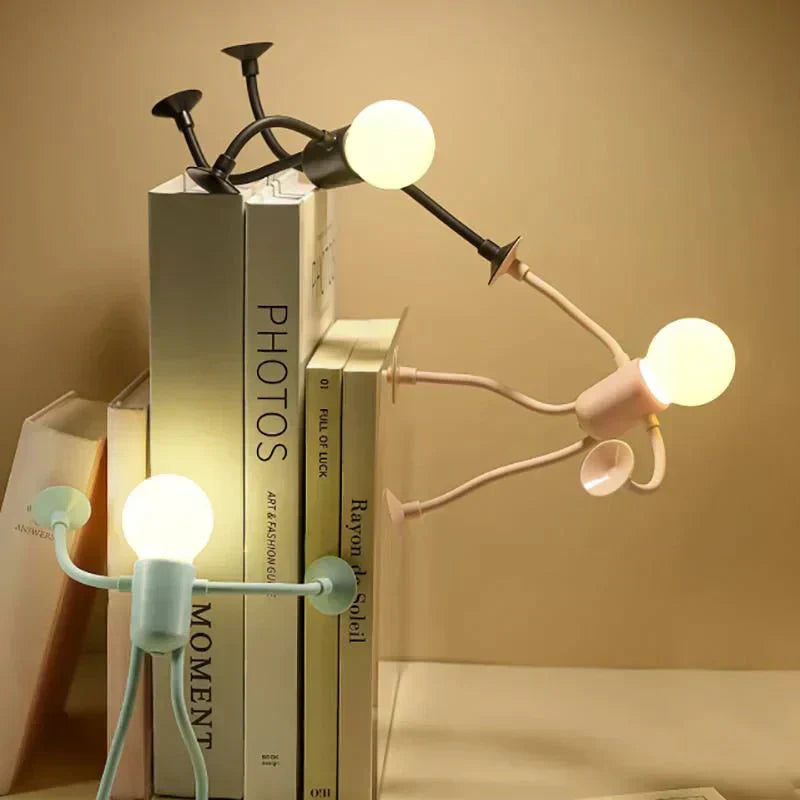 Aarenza LightBuddy™ LED lamp shining softly, portable and compact, perfect for creating cozy lighting in any space.