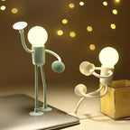 Aarenza LightBuddy LED lamp in a cozy setting, showcasing its portable design and warm light for relaxing moments.