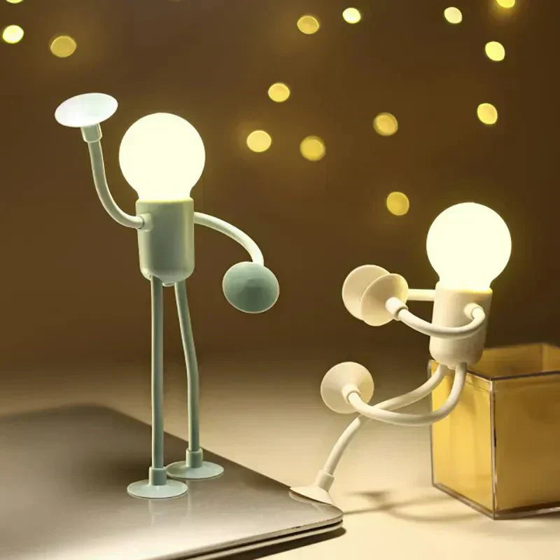 Aarenza LightBuddy LED lamp in a cozy setting, showcasing its portable design and warm light for relaxing moments.