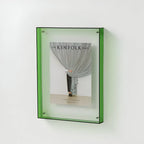 Clear acrylic picture frame by Arenzza, minimalist wall-mounted photo frame for displaying images stylishly on the wall.