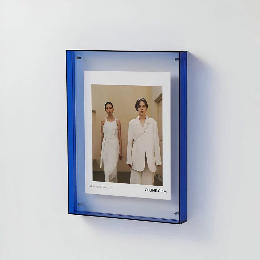 Clear acrylic picture frame by Arenzza, minimalist wall-mounted photo display with sleek transparent design.