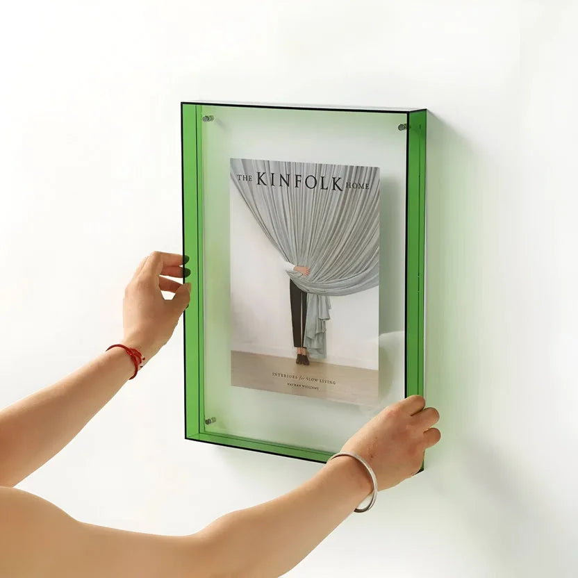 Clear acrylic minimalist wall picture frame by Arenzza, showcasing a sleek, modern design for displaying photographs or artwork.