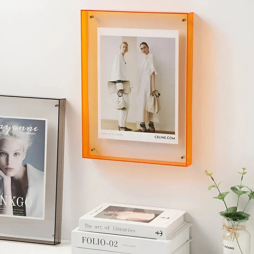 Clear acrylic picture frame by Arenzza, minimalist wall-mounted design with sleek transparent edges for modern home decor.