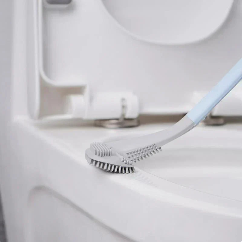 Arenzza silicone toilet brush with a sleek handle and cleaning head for sparkling clean toilets, shown in a bathroom setting.