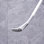 Arenzza silicone toilet brush with ergonomic handle and flexible bristles for easy cleaning of sparkling clean toilets.