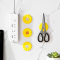 Arenzza wall-mounted magnetic sunflower hook with no drilling, featuring a decorative sunflower design and magnetic attachment.
