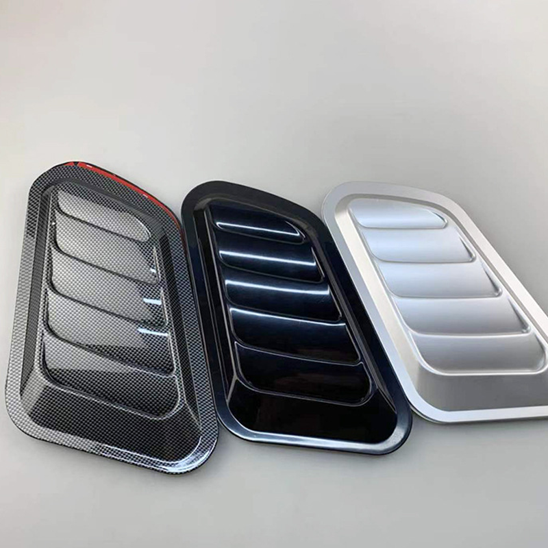 Arenzza universal car hood vent decoration accessory installed on a vehicle, enhancing the car's sporty and stylish appearance.