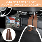 Arenzza durable car seat headrest hook storage organizer attached to a car headrest for convenient item hanging.