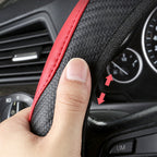 Arenzza universal classic non-slip steering wheel protector fitted on a car steering wheel for improved grip and comfort.