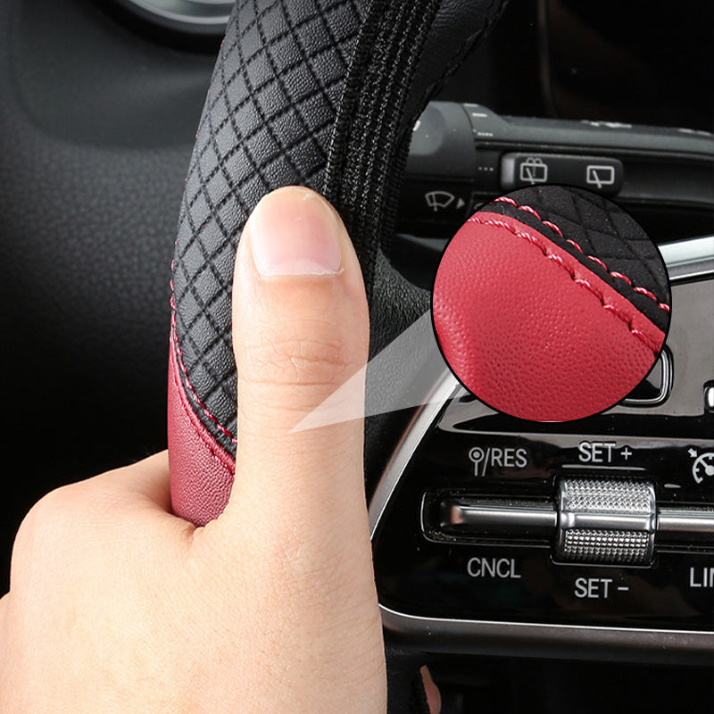 Arenzza Universal Classic Non-Slip Steering Wheel Protector installed on a car steering wheel, enhancing grip and protecting the surface.
