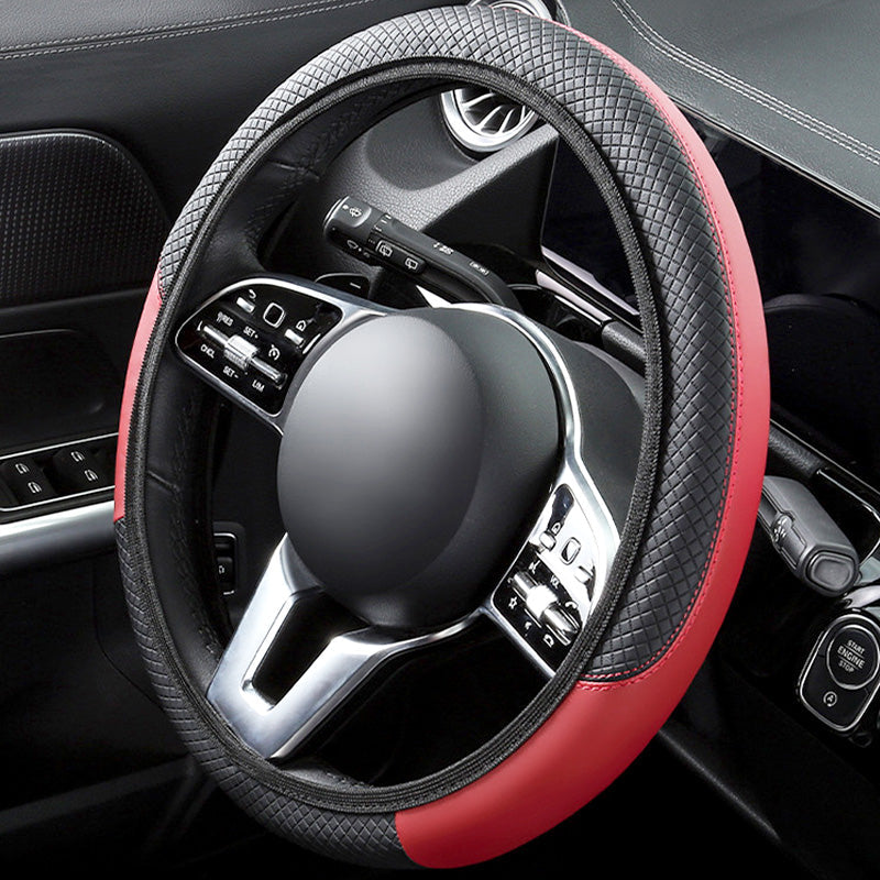 Arenzza Universal Classic non-slip steering wheel protector attached to a car steering wheel, showing textured surface and secure fit.