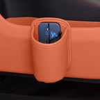 Arenzza universal leather car door cup holder installed in a vehicle door, holding a beverage cup for easy access.