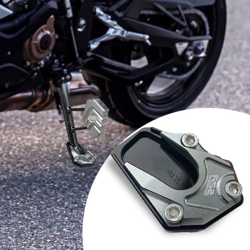 Arenzza motorcycle kickstand foot side stand extension attached to a motorcycle, providing additional support and stability.