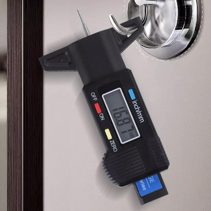 Arenzza digital car tyre tread depth gauge meter showing measurement display and metal probe for checking tyre tread depth.