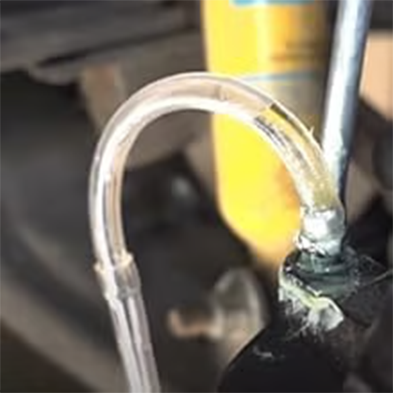 Arenzza Brake Bleeder Hose with One Way Check Valve, car accessory for brake fluid maintenance, showing the hose and valve in detail.