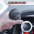 Arenzza steering wheel booster knob for effortless driving, attached to a car's steering wheel, enhancing grip and control.
