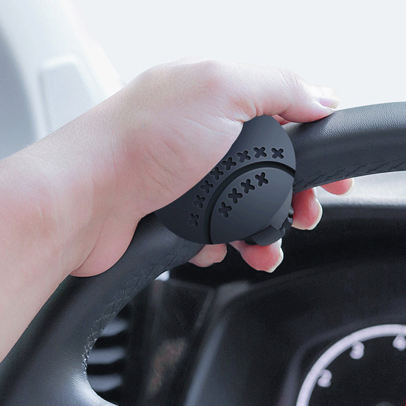 Arenzza steering wheel booster knob for effortless driving, car accessory mounted on steering wheel with easy grip design.