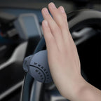 Arenzza steering wheel booster knob installed on a car steering wheel, making driving easier and more comfortable.